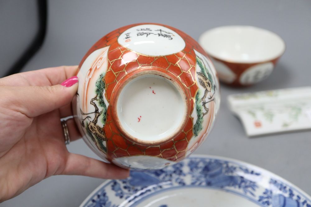 A group of four Chinese ceramics, two bowls, plate and chopstick stand